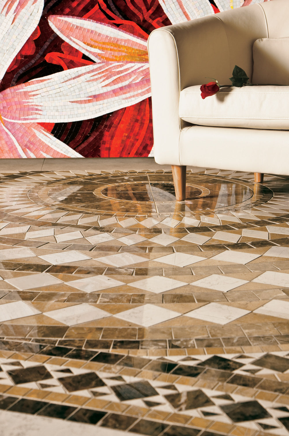 Ornamental marble mosaic floor in warm brown and beige tones.