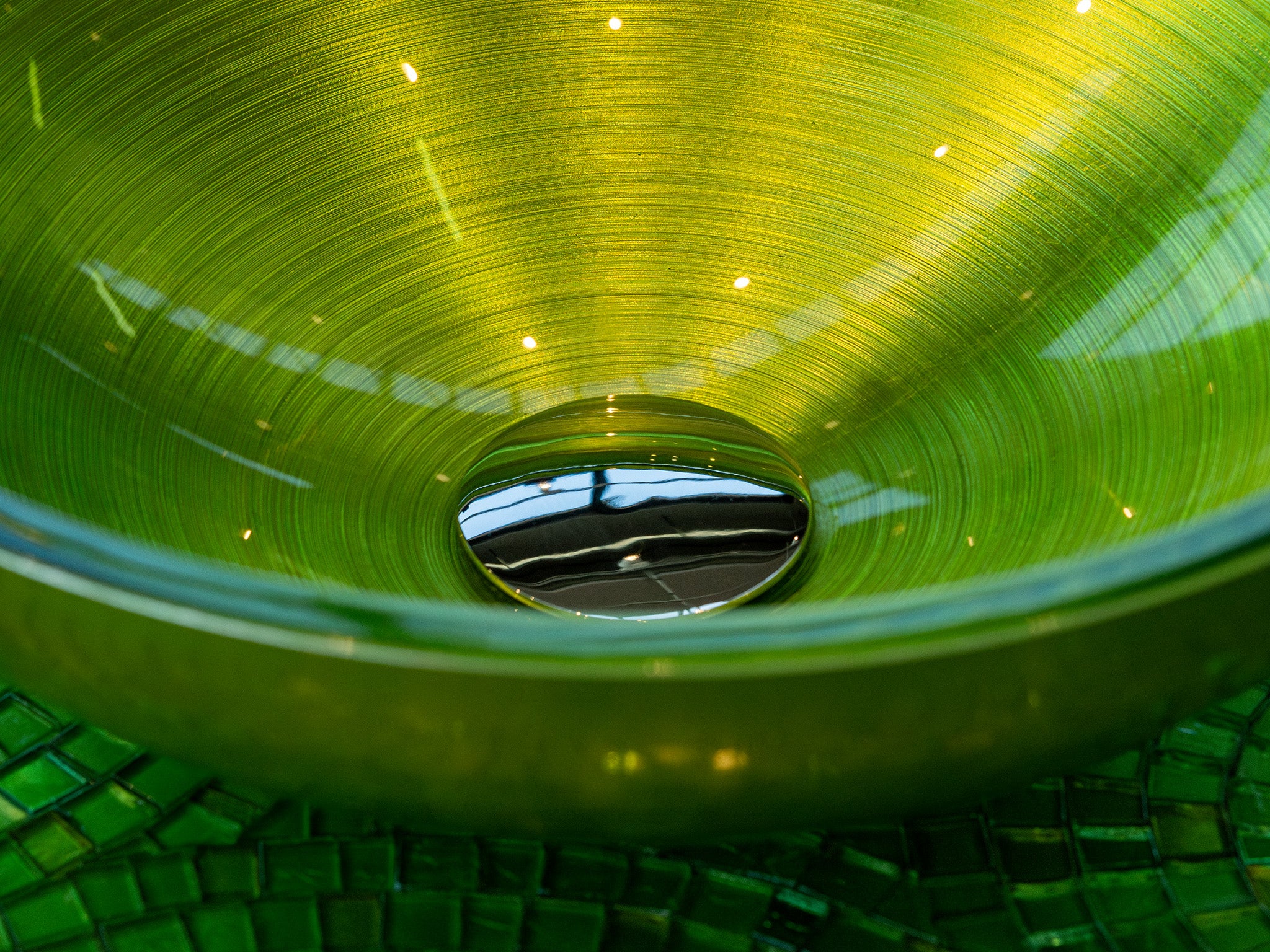 Round premium glass basin in Green. With a fluted interior finish of Italian craftsmanship, available in the Tiamont online boutique for refined bathroom furniture.