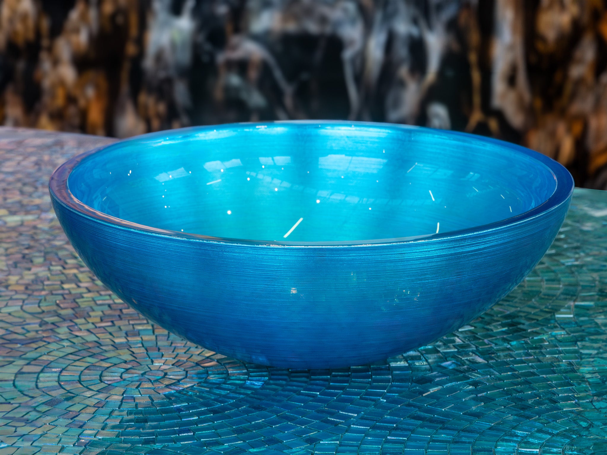 Round premium glass basin in Turquoise. A jewel for your bathroom. With a fluted interior finish, Italian craftsmanship by Sicis, available in the Tiamont online boutique for refined bathroom furniture.
