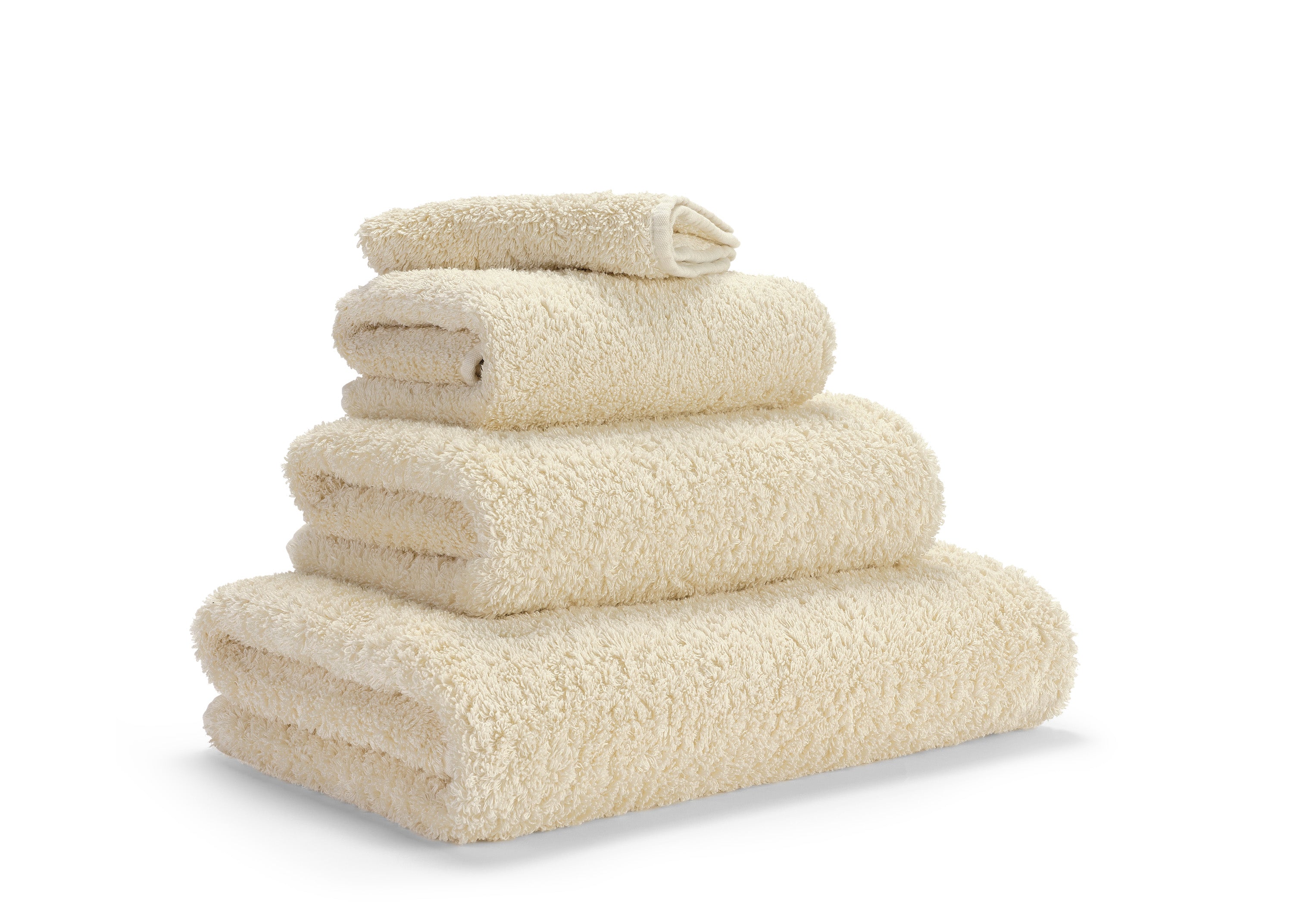 Premium towels in Egyptian Giza 70 cotton in Beige – luxurious bathroom textile at the Tiamont shop, matching refined bathroom furniture and stylish interiors. Handmade in Portugal. 