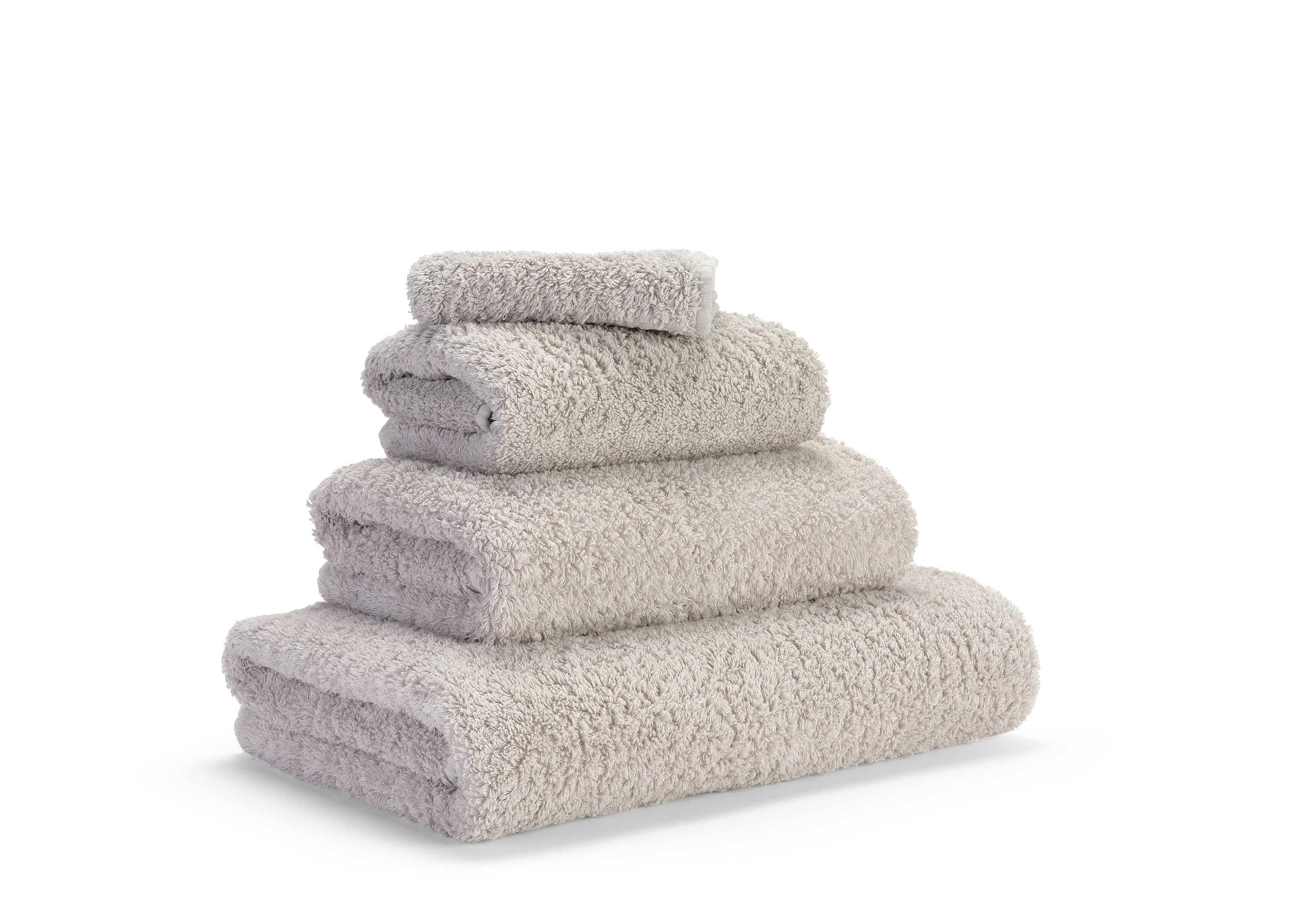 Premium towels in Egyptian Giza 70 cotton in Grey – luxurious bathroom textile by Tiamont, matching refined bathroom furniture and stylish interiors. Handmade in Portugal.