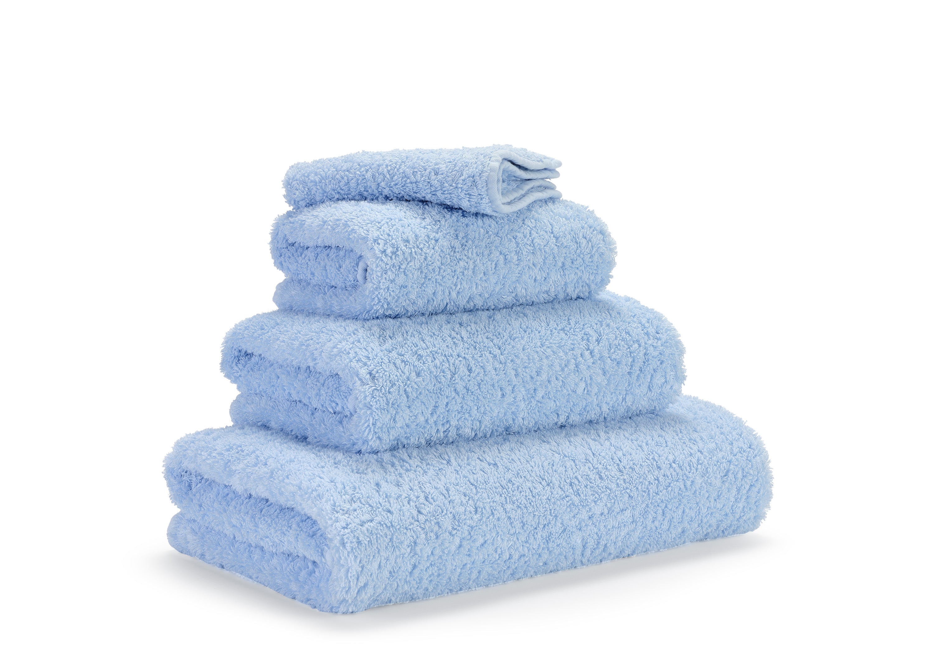 Premium towels in Egyptian Giza 70 cotton in Light Blue / Baby Blue – luxurious terry at the Tiamont shop, matching refined bathroom furniture and stylish interiors. Handmade in Portugal. 